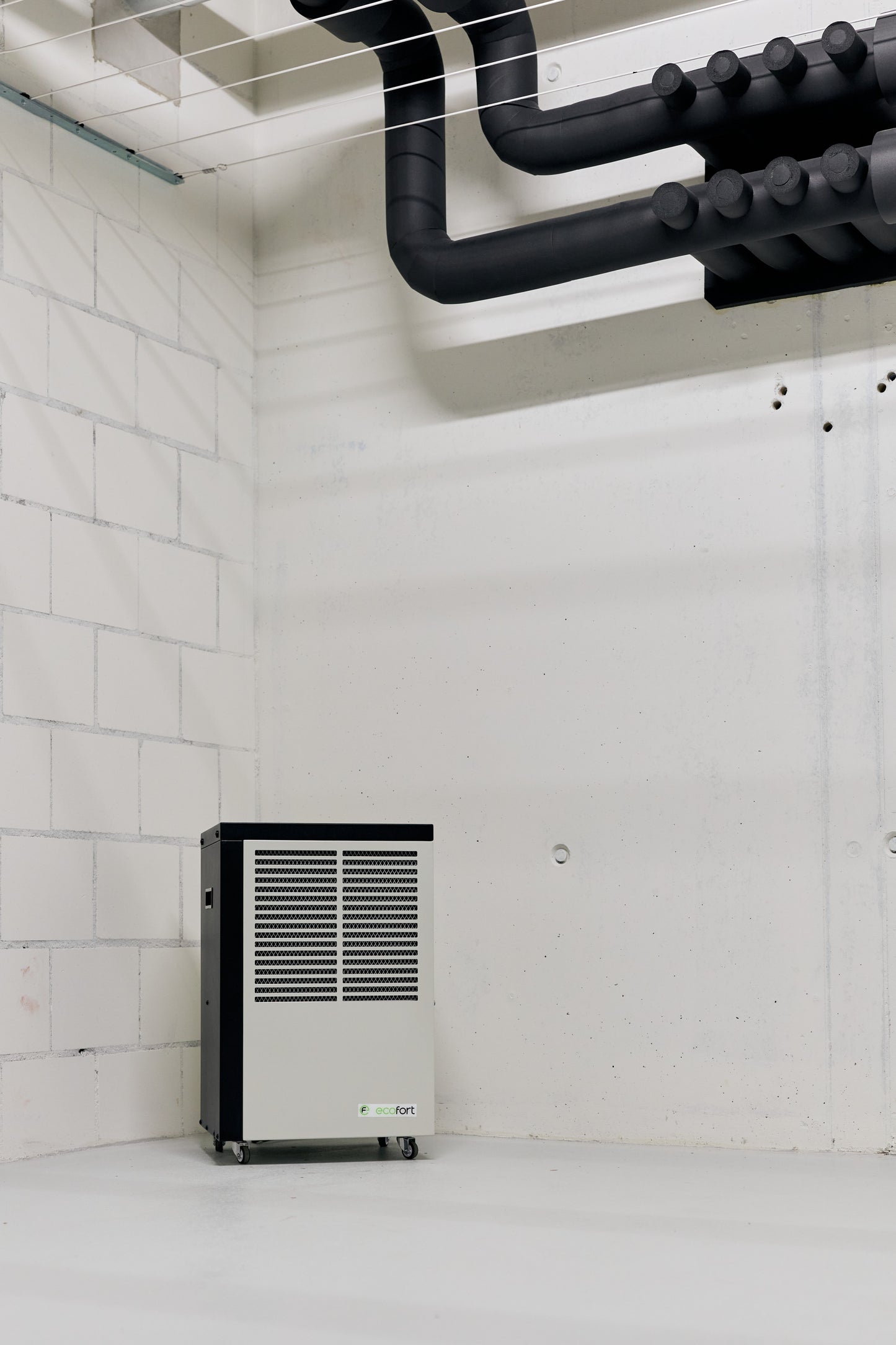 ecodry Neptun Wäschetrockner in Creamy White, ideal für Räume bis 20 m² mit Hygrostat-Steuerung.