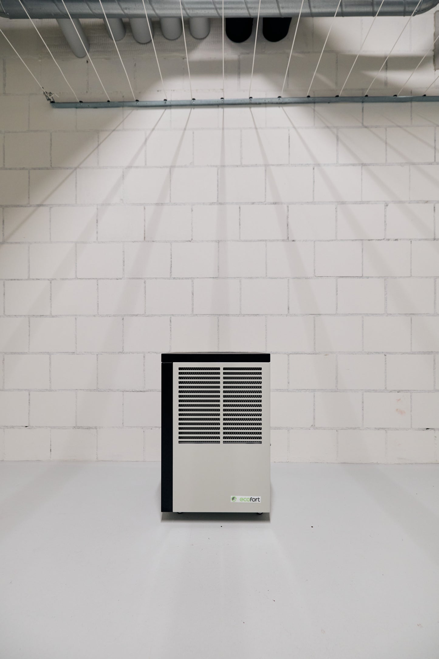 ecodry Neptun Wäschetrockner in Creamy White für Räume bis 135 m², mobil mit Hygrostat-Steuerung.