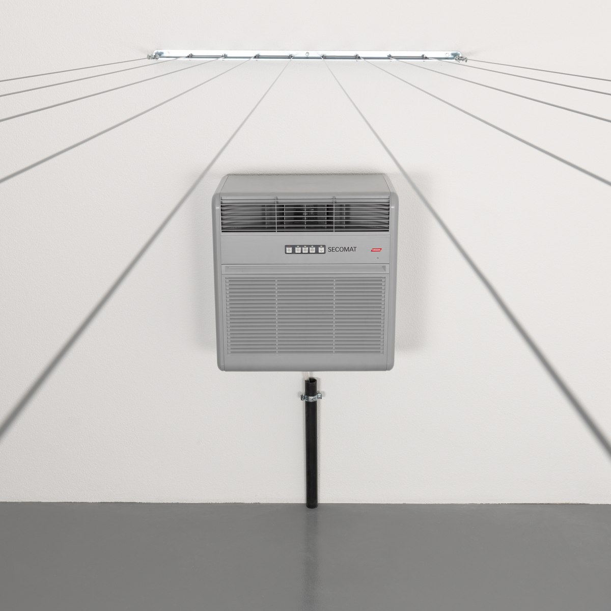 Secomat 100 Wäschetrockner an der Wand mit Feuchtigkeitskontrolle und einfachem Bedienkonzept.